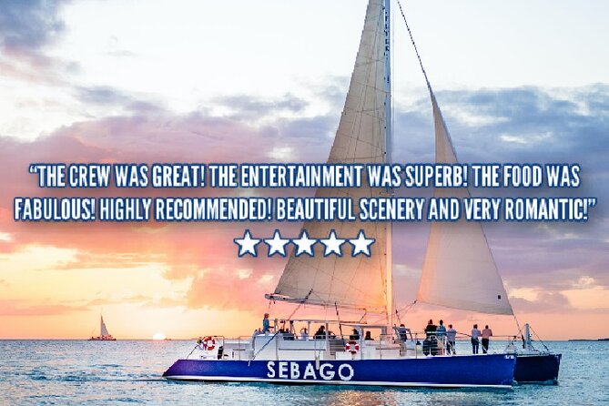 Key West Sunset Sail: Dolphin Watching, Wine, and Tapas - Cruising by Sunset Key as the light changes