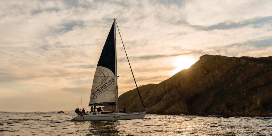 Knysna Sunset Sailing Cruise with Light Dinner and Wine - Sunset, Cap Classique, and the light meal