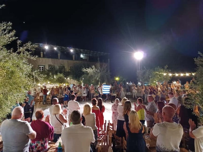 Kos: Greek Dinner with Music, Dancing, and Unlimited Wine - Stuffed cabbage, pork, and Smyrneika meat steaks