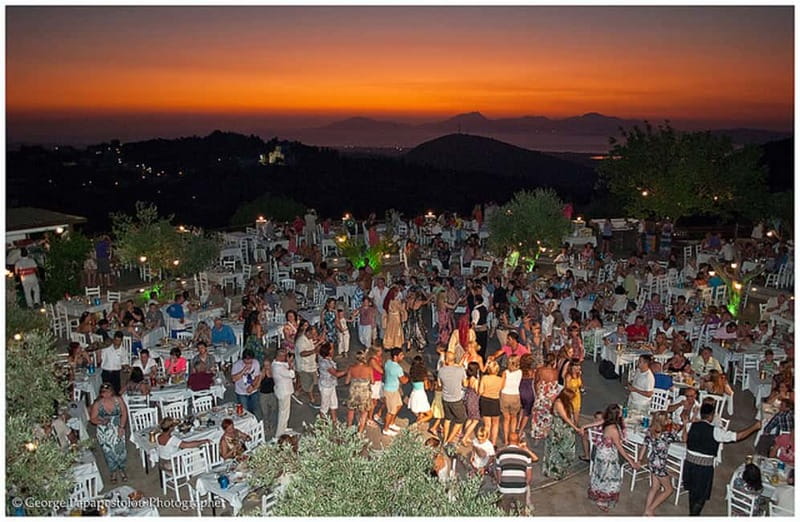 Kos: Greek Dinner with Music, Dancing, and Unlimited Wine - The main platter arrives from the wood oven