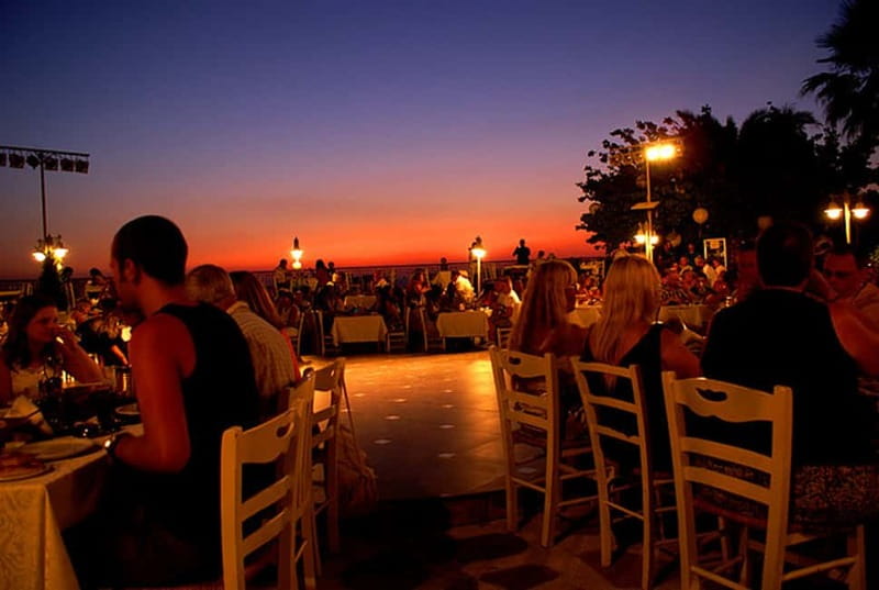 Kos: Greek Dinner with Music, Dancing, and Unlimited Wine - The opening spread: salads, dips, and Greek pastry