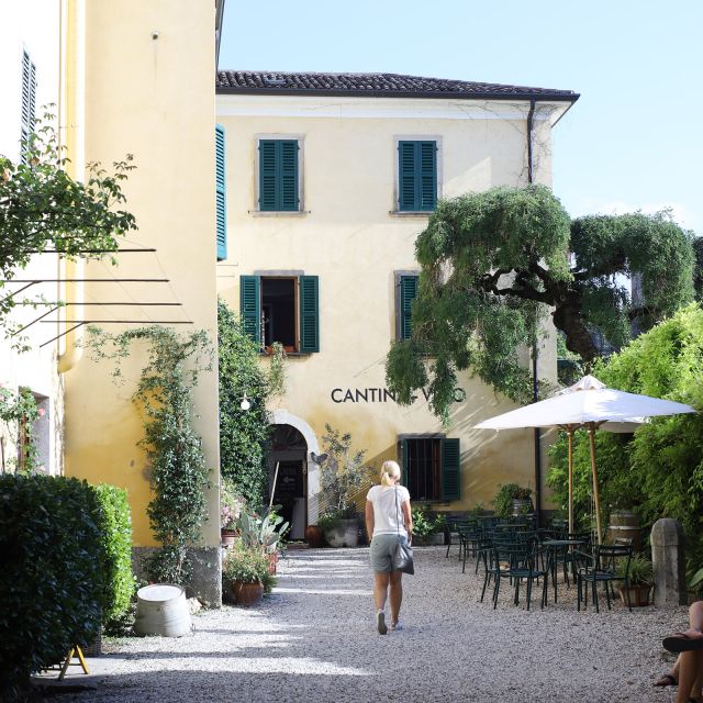 Lazise: Historical Center Wine Tasting Tour - Entering the Historic Courtyard and Cellar
