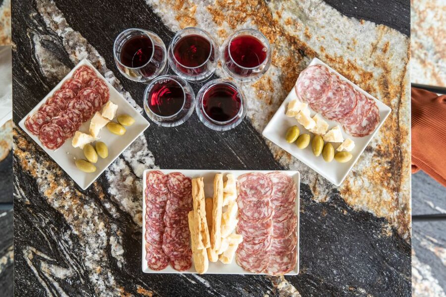Lazise: Vineyard Tour and Organic Wine Tasting - Buying Bottles at the Modern Wine Shop