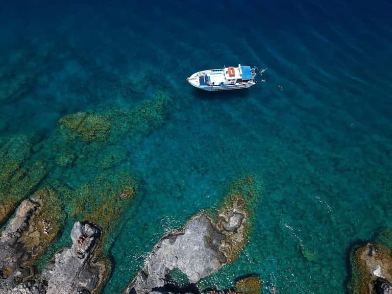 Lindos: Sunset Cruise with Unlimited Aperol, Beers & Wine - Photographing Lindos from the sea