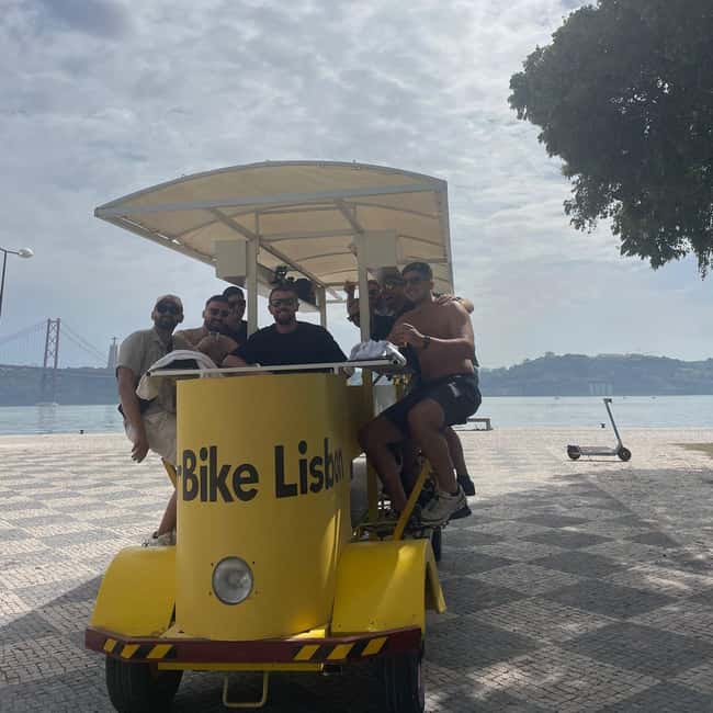 Lisbon: 1-Hour Beer, Sangria or Wine Bike Sightseeing Tour - Music, Lights, and the Group Atmosphere