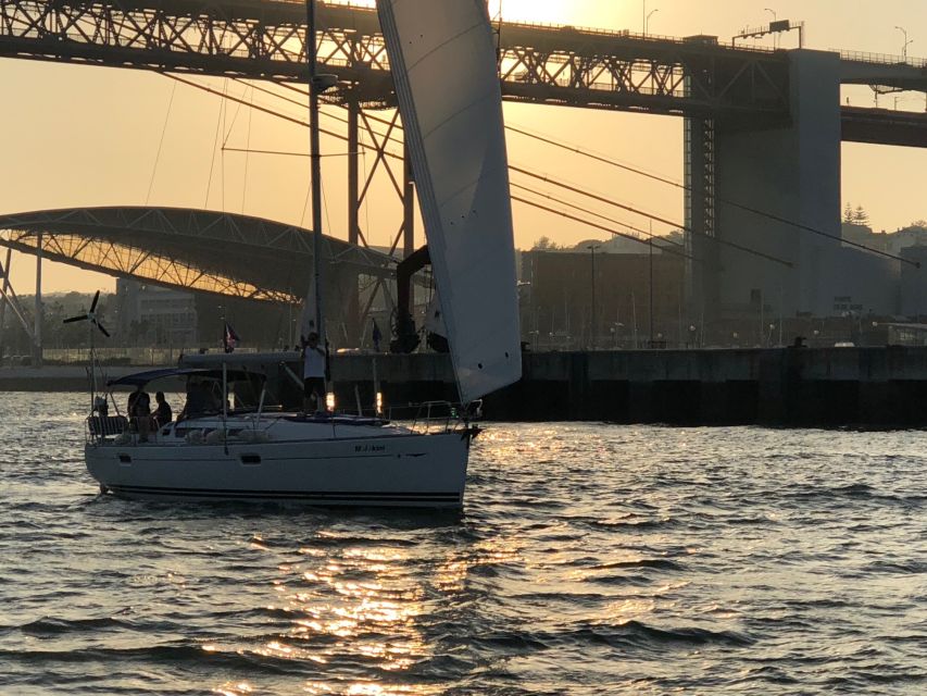 Lisbon: Private Sunset Sailing Tour with Champagne - What the crew adds to the experience