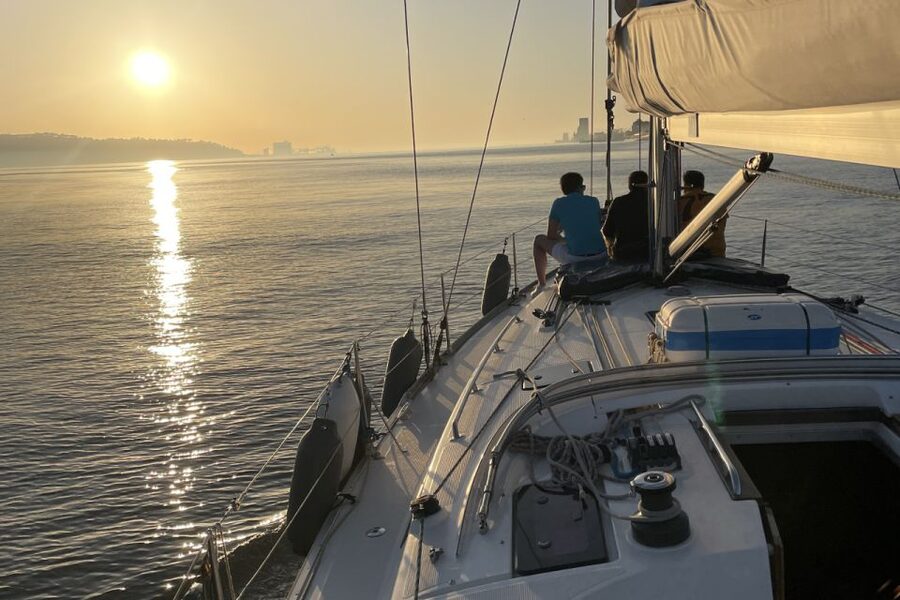 Lisbon: Sunset Sailing Boat Cruise with Wine - Belém Tower and the riverfront monuments