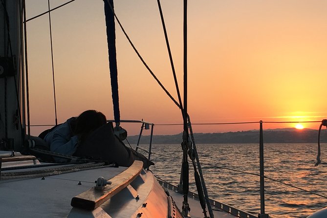 Lisbon Sunset Sailing Tour with White or Rosé Wine and Snacks - Belém Tower and Portugal’s seafaring past