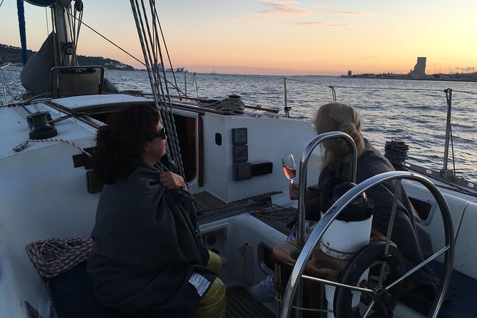 Lisbon Sunset Sailing Tour with White or Rosé Wine and Snacks - Wine, cheese, and the social side of the sail