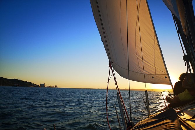 Lisbon Sunset Sailing with Portuguese Wine and History - Timing, weather, and who should book