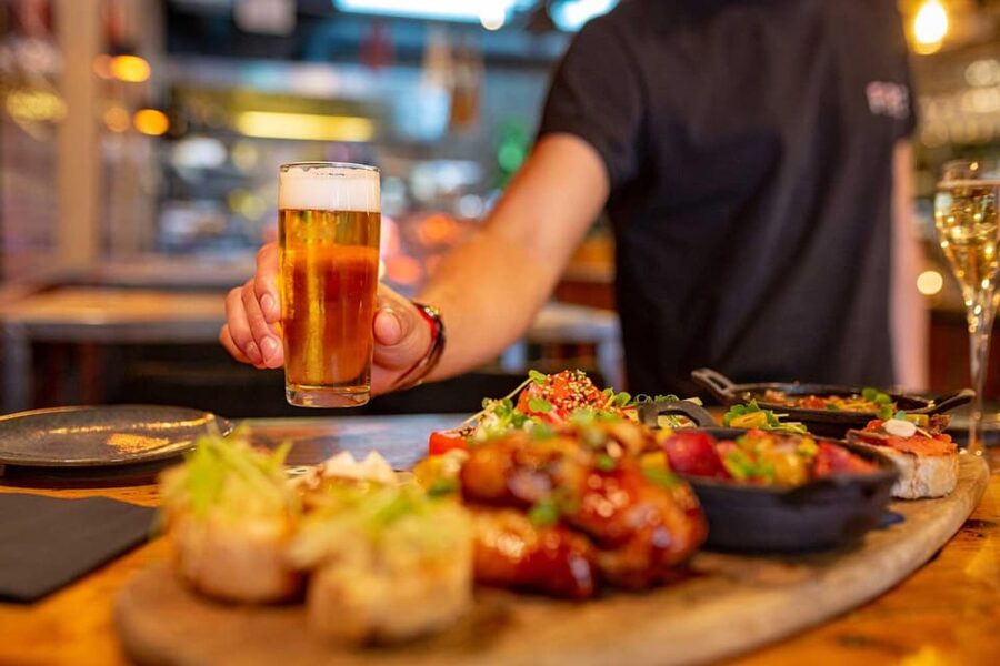 Madrid: Tapas & Wine Tour with Visit to a Rooftop - Plaza Mayor: Madrid history between bites