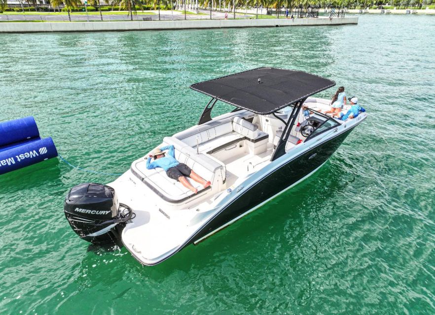 Miami: Guided Boat Tour with Champagne - Flagler Memorial Island and the swimming stop