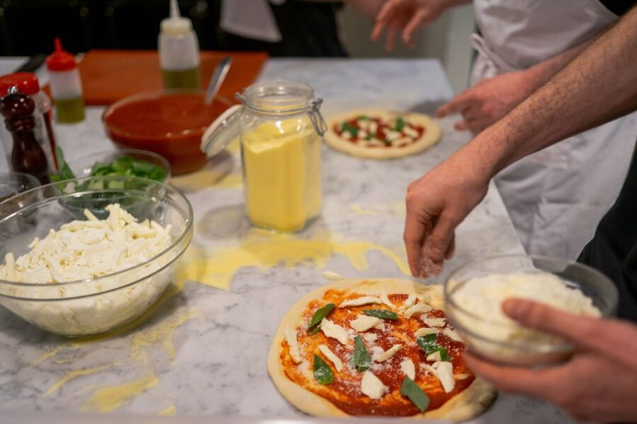 Milan: Pizza or Pasta and Gelato-Making Class with Wine - Families, teenagers, and solo visitors
