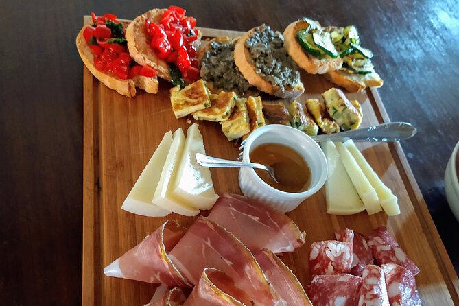 Montalcino: Brunello Wine Tasting & Lunch in a Tuscan Castle - Inside the castle and barrel room