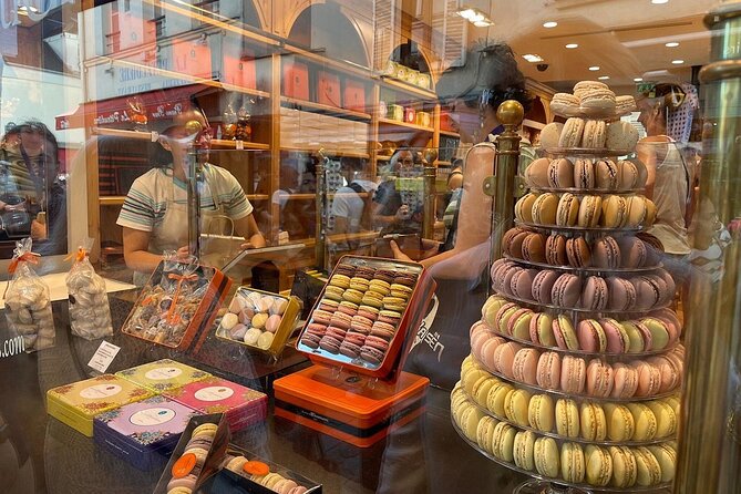 Montmartre Hill French Gourmet Food and Wine Tasting Walking Tour - Eight stops, from macarons to wine and cheese