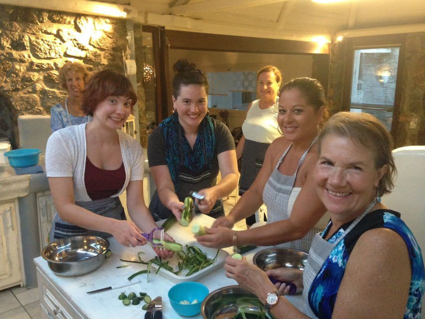 Mykonos: Cooking Class with Food and Wine - Sitting down to eat what you made