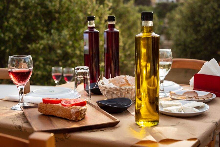 Mykonos: Winery Vineyard Experience with Food & Wine Tasting - Walking through the olive grove and vines