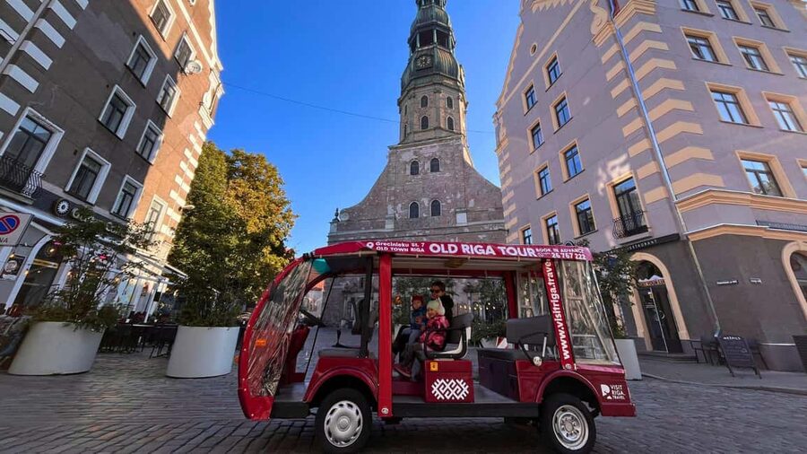Old Riga Heated E-Bus Tour with Audio Guide & Mulled Wine - The heated e-bus matters in Latvian winter