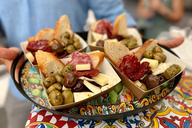 Palermo Food Tour: 10+ Tastings of Arancini, Cannoli, Wine & More - Vucciria Market: from butcher stalls to city symbol