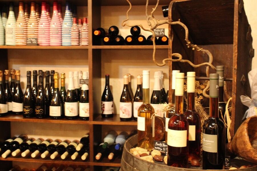 Palma Tour with Wine and Tapas Tasting - Olive oil, ham, cheese, and Spanish tapas