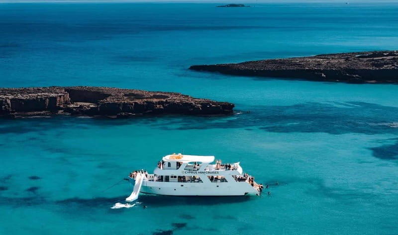 Paphos: Blue Lagoon Afternoon Cruise with Swim, BBQ & Wine - Boarding at Latchi and cruising the Akamas coast