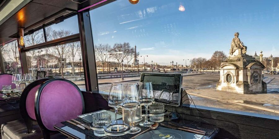 Paris: Champs Elysées Bus Toqué w/Lunch & Glass of Champagne - A four-course meal with a Paris view