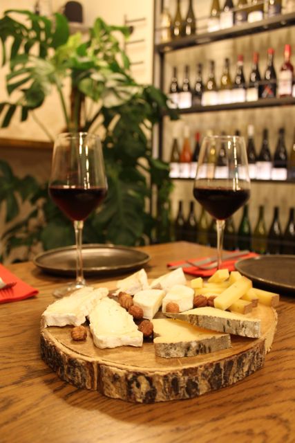 Paris: French Wine and Cheese Guided Tasting - Five glasses, five cheeses, and a clear tasting order