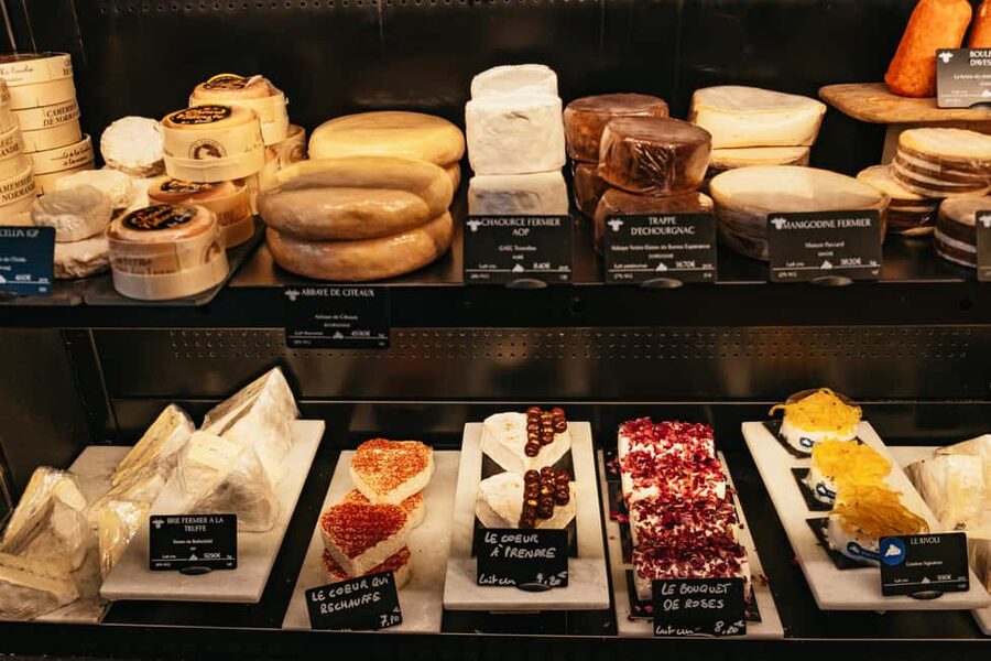 Paris: Gourmet Food Tour with Over 10 Tastings and Wine - Paris’s Famous Market Street and a Royal Pastry Connection