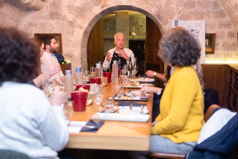 Paris: The Ultimate Wine and Cheese Tasting in English - Entering the Les Caves du Louvre tasting room