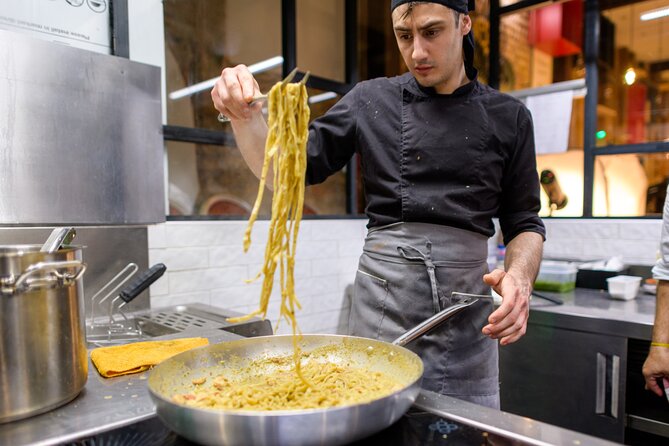 Pasta and Tiramisu Cooking Class with Wine in Venice - Rolling pasta dough and shaping the meal