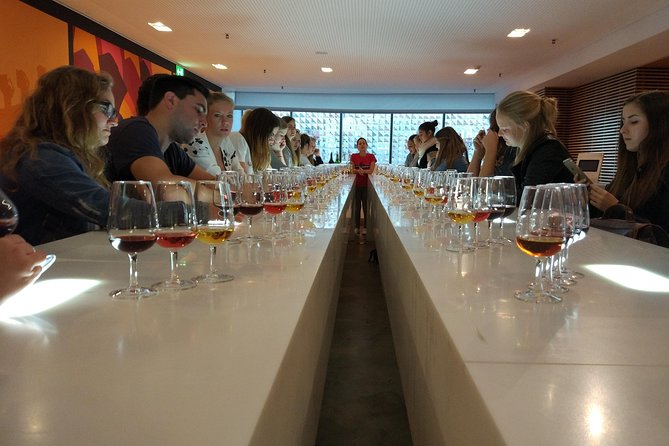 Port Wine Lodges Tour Including 7 Port Wine Tastings (English) - The second cellar: barrels, cork, and young Ruby Port