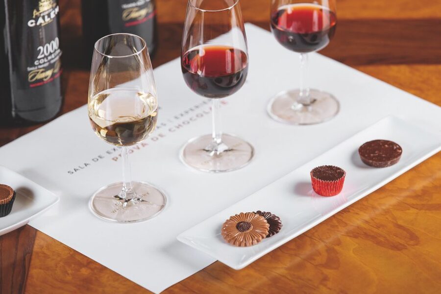 Porto: Cálem Cellar with Chocolate, Cheese, and Wine Tasting - Inside the active cellar