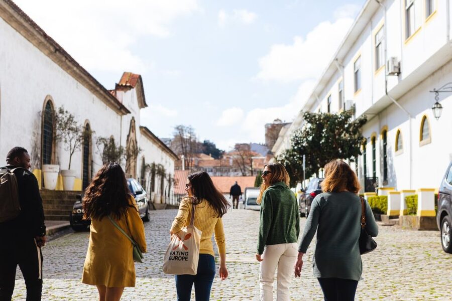 Porto: Food & Wine Tasting Walking Tour with Port Wine Cave - Pastel de Chaves, bacalhau, and local dishes