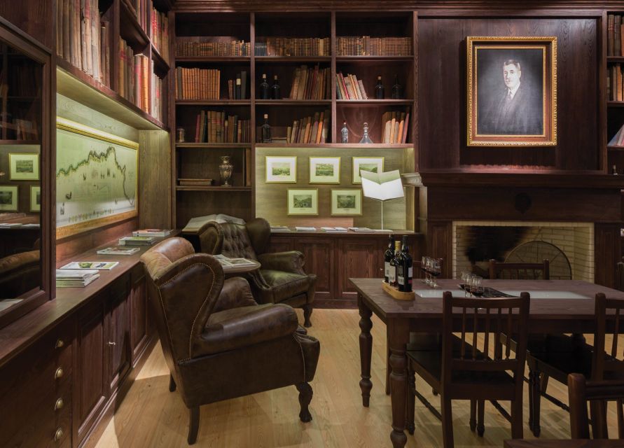 Porto: Graham's Port Lodge Tour & Vintage Room Wine Tasting - Inside the working cellar with 2,000 oak pipes