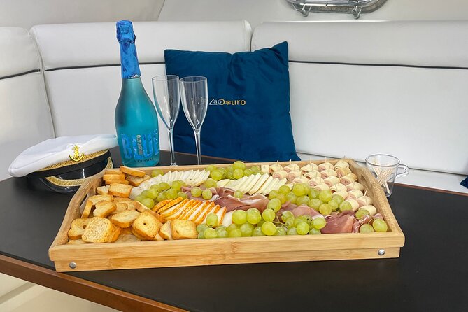 Porto: Private Yacht Cruise with Local Wine, Snacks and 6 Bridges - The riverfront sights between the bridges