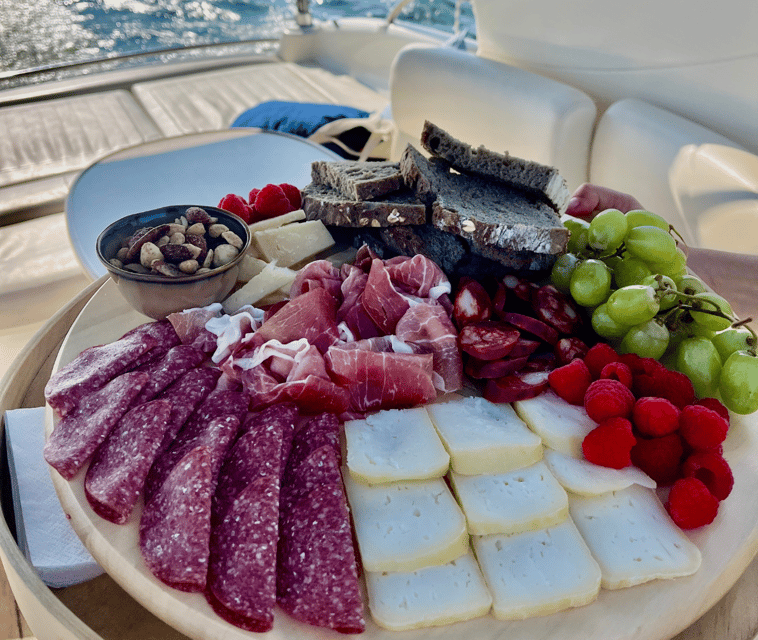 Porto: Private Yacht Tour with Wine, Snacks & 6 Bridges - Wine, cheese, and regional snacks onboard