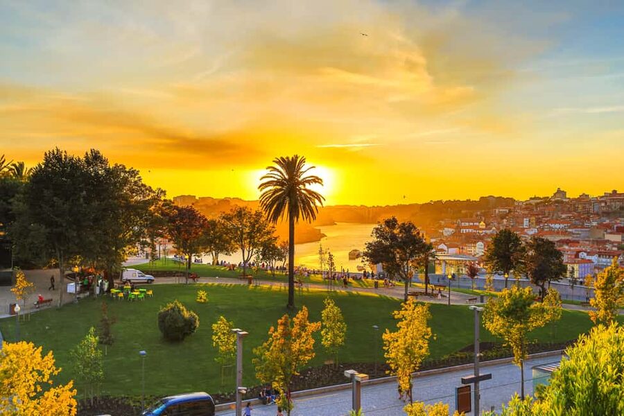 Porto: Sunset Walking Tour with Port Wine and Views - Carmo and Carmelitas Church, with a small local secret