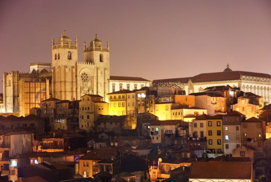Porto: Sunset Walking Tour with Port Wine and Views - Porto Cathedral and the walk toward the Luis I Bridge