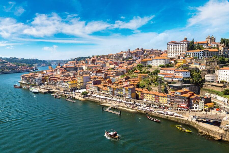 Porto: Tuk-Tuk Tour, Douro River Cruise, and Wine Tasting - Port wine tasting in a Porto cellar