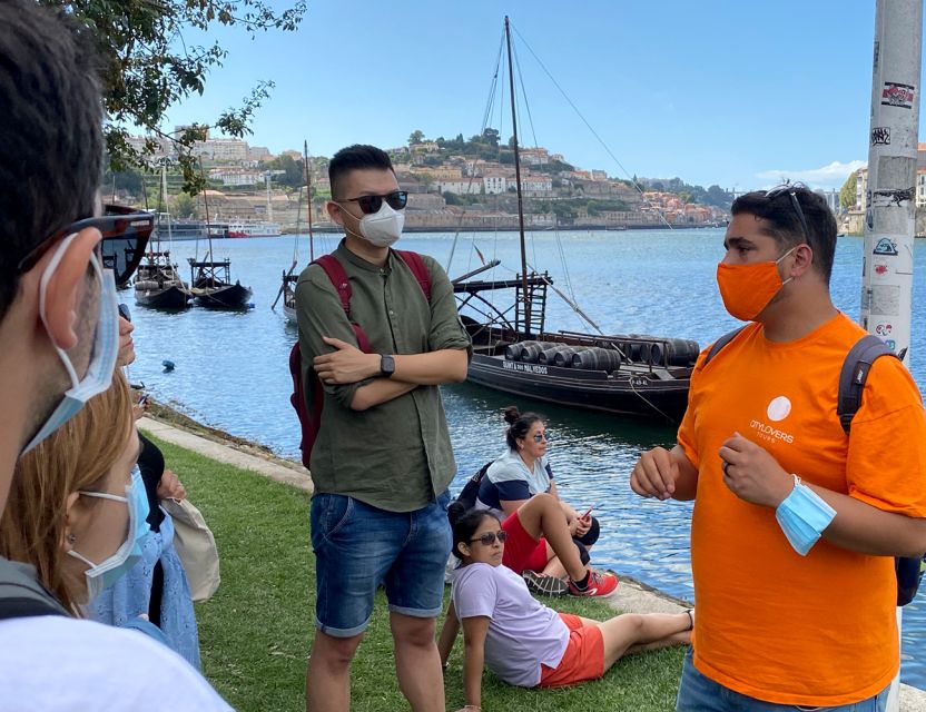 Porto: Wine Tasting with Tapas Walking Tour - Walking through Porto and Ribeira
