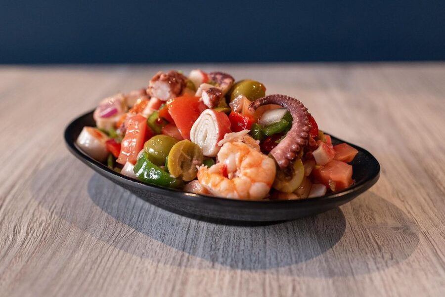 PREMIUM TAPAS TOUR: Paella, Market Tastings, and Winery - Paella, salad, and a drink near the Cathedral