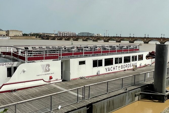 Prestige Commented Cruise glass of wine and Canelé in Bordeaux - Bordeaux’s historic center from the Garonne