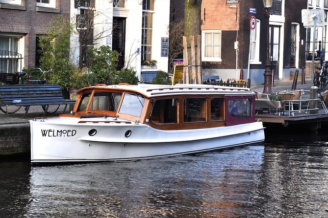 Private Champagne Canal Cruise in Amsterdam - Champagne, snacks, and the semi-open bar