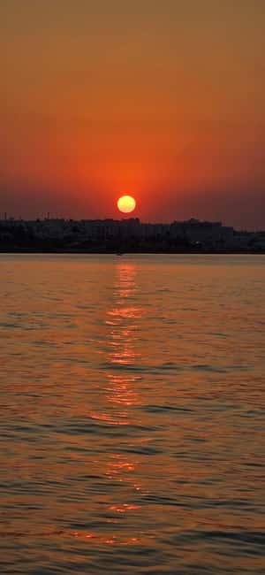 Protaras Blue Lagoon Sunset Tour with Pizza & Champagne - Champagne and sunset on the return