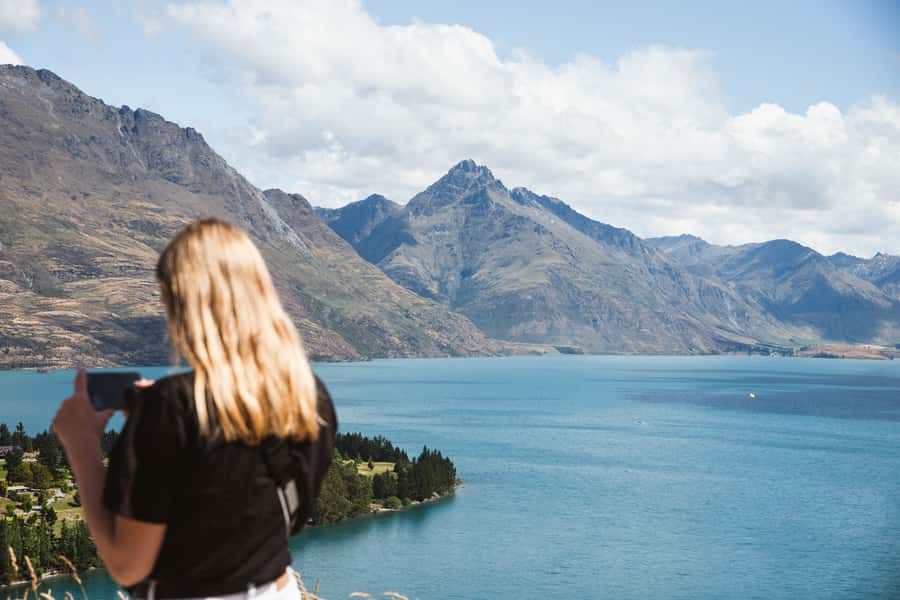 Queenstown: Scenic Highlights, Tour with Wine & Lake Cruise - Starting above Queenstown with wide views