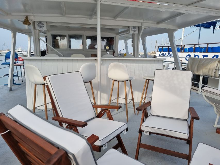 Rhodes: Bay to Bay Swim Cruise with Greek Buffet and Wine - Two decks, open water, and the practical comfort level