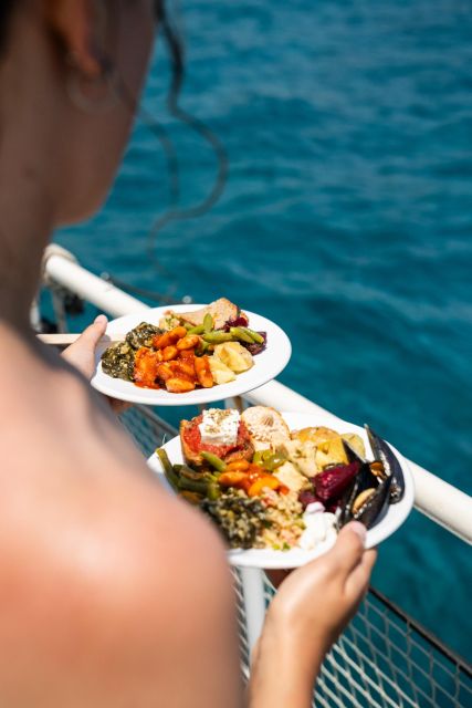 Rhodes: Bay to Bay Swim Cruise with Greek Buffet and Wine - Booking details worth knowing before you go