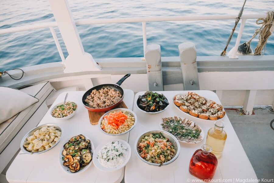 Rhodes: Sunset Cruise with Live Music, Wine & Greek Buffet - What $53 buys you in practical terms