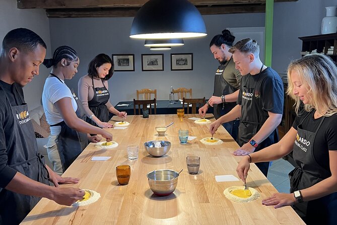 Rome Pasta Making Class with Italian Sauces and Wine Included - Ravioli, fettuccine, and spaghetti alla chitarra