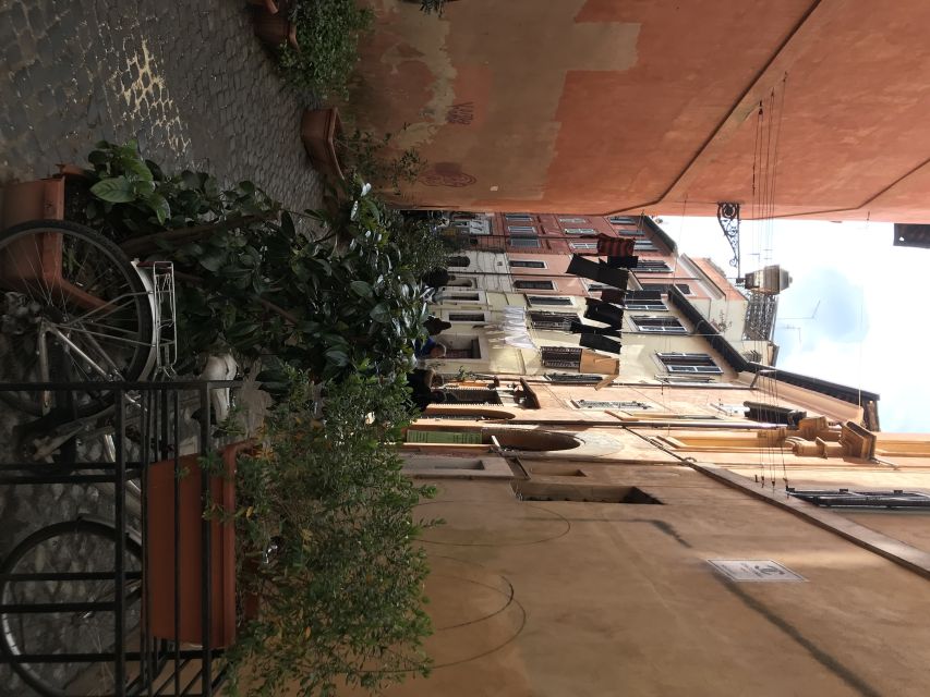 Rome: Trastevere Guided Food and Wine Tour with 20+ Tastings - Stop three: handmade pasta and an old wood-fired oven